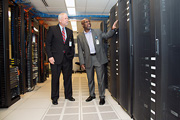 Paul Robinson, Facility Chief Information Officer, explains the new consolidated server room to Mr. Devansky.
