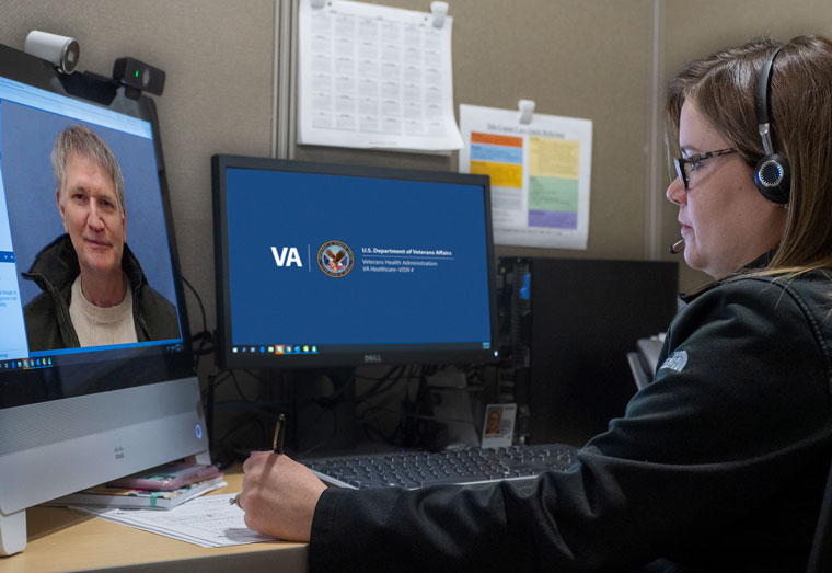 Veteran Richard Rauch talks remotely over VA Video Connect with a clinician in the VISN 4 tele urgent care clinic.