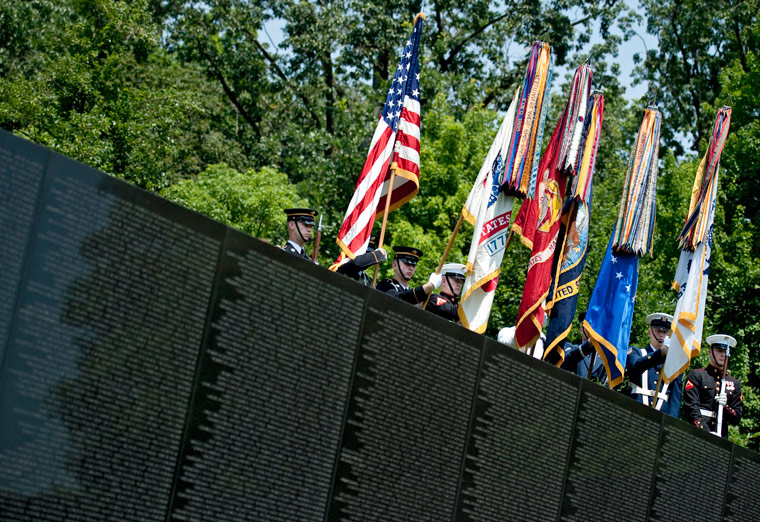 The Joint Service Color Guard presents the colors at the Vietnam Veterans Memorial in Washington, D.C.