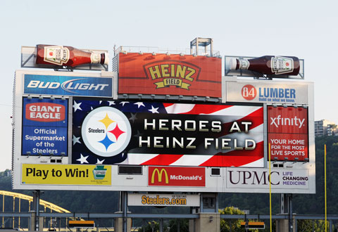 The scoreboard with the words Heroes at Heinz Field.