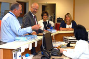 Network Director Michael E. Moreland tours the new Emergency Department.