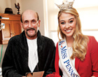 2013 Miss Pennsylvania visits with a patient.