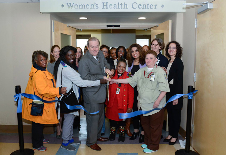 Members of leadership from Corporal Michael J. Crescenz VA Medical Center cut the ceremonial ribbon for the new womens health center.
