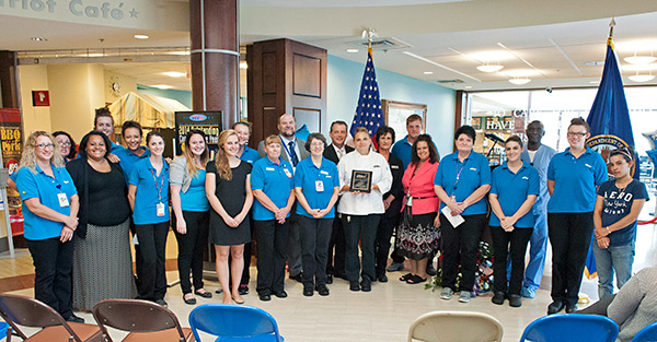 A large group of employees from the Lebanon VA canteen display thier award.